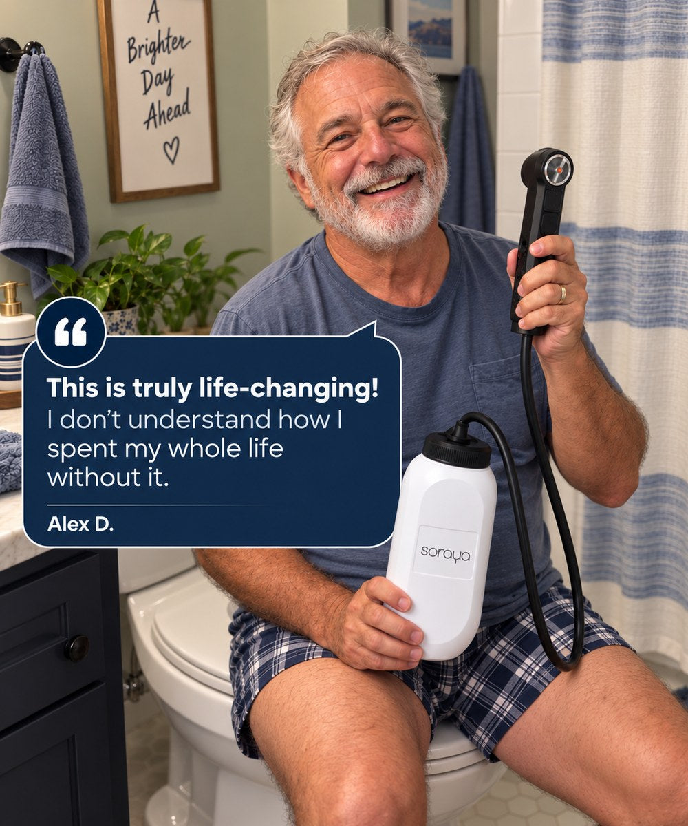 Customer seated holding the Soraya portable bidet